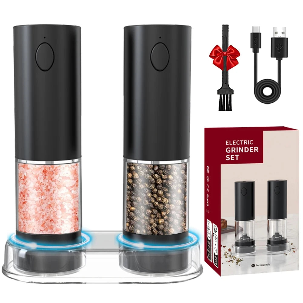 Electric pepper and salt grinder set with packaging, cable, and brush on a white background.
