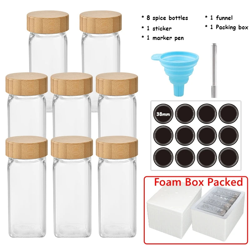 Set of clear spice bottles with wooden lids, funnel, marker pen, and additional components on a white background.