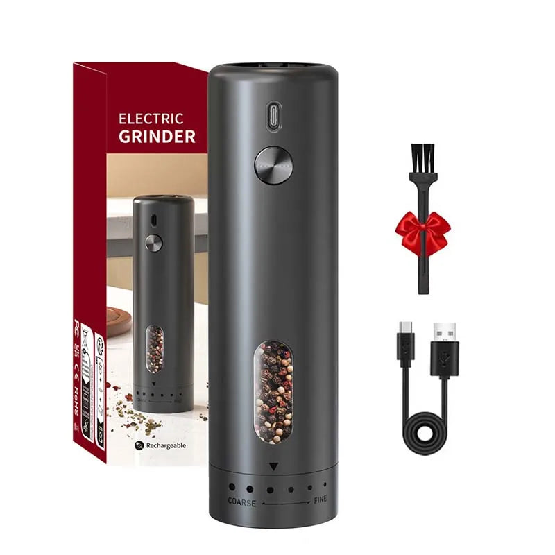 Black electric grinder with packaging, USB cable, and brush on a white background