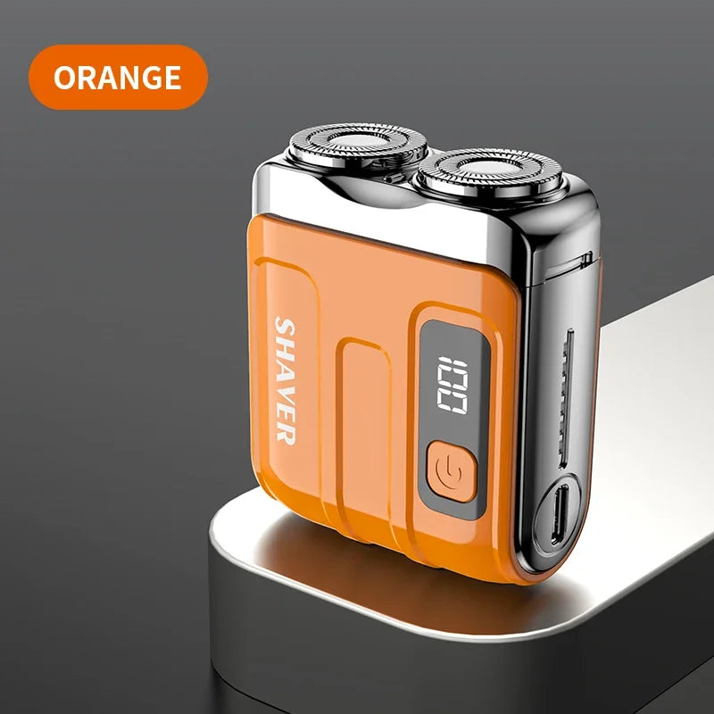 Orange shaver with digital display on a dark background