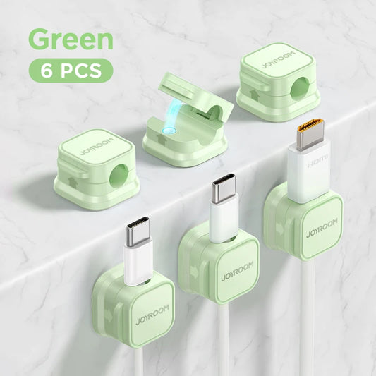 Green cable protectors with USB connectors on a white background