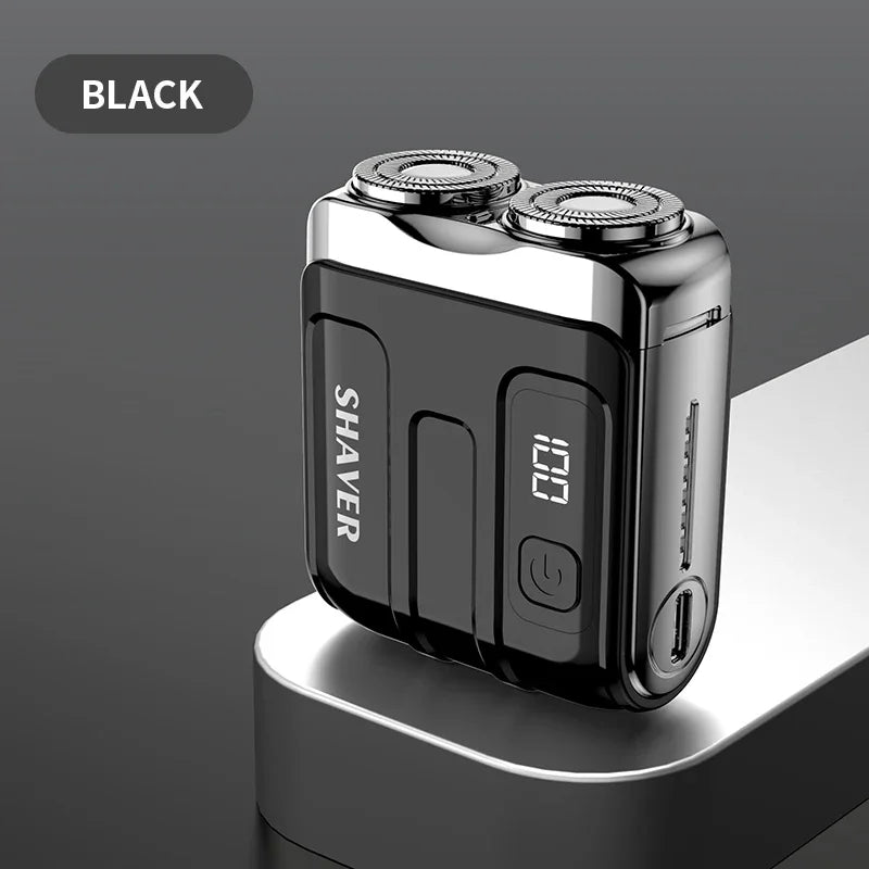 Black shaver with digital display on a gray background