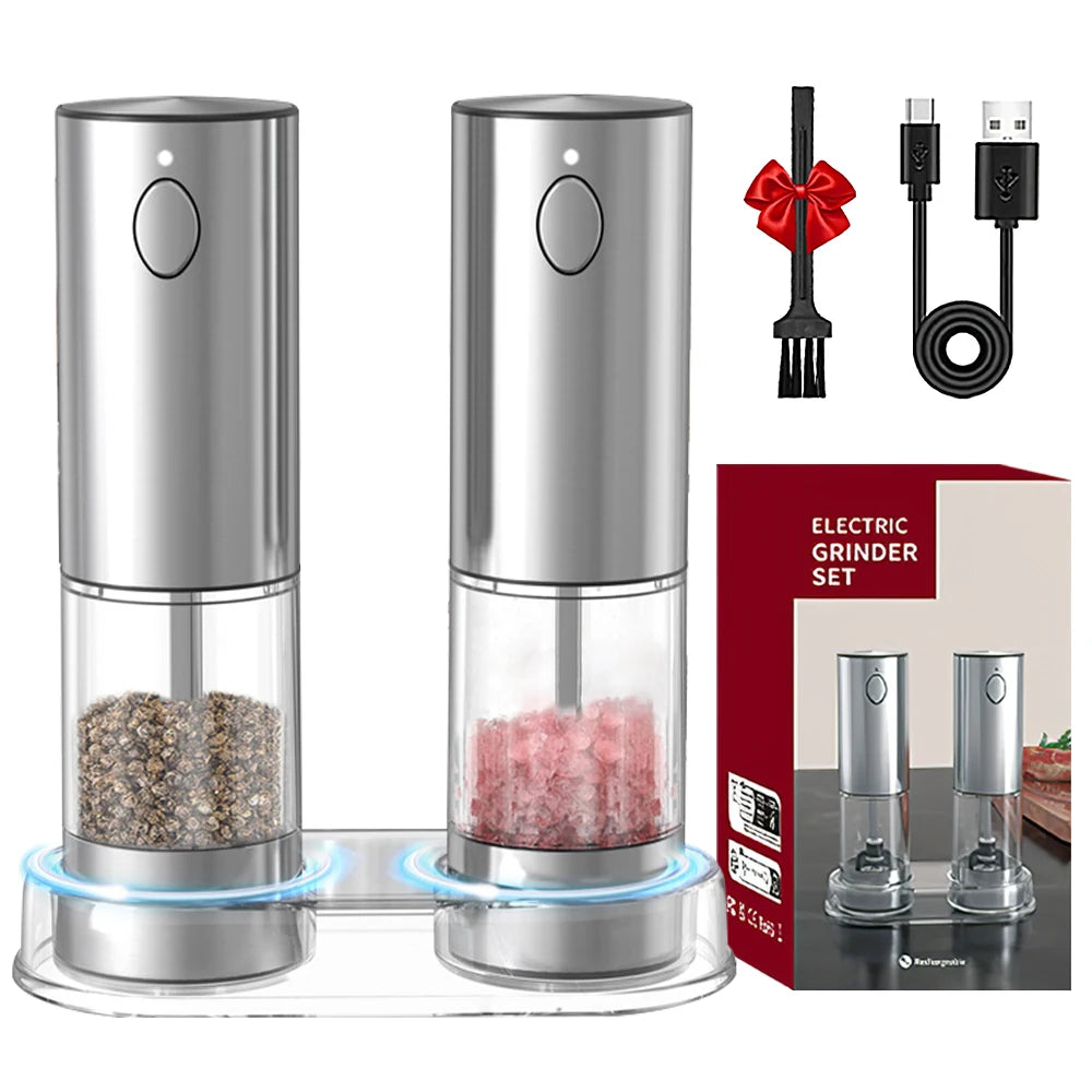 Electric salt and pepper grinders with packaging, fork, and cable on a white background