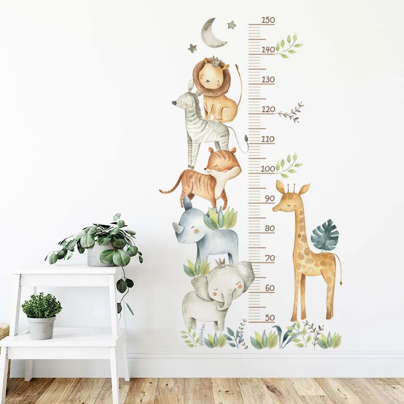Children's growth chart with animal illustrations on a white wall.
