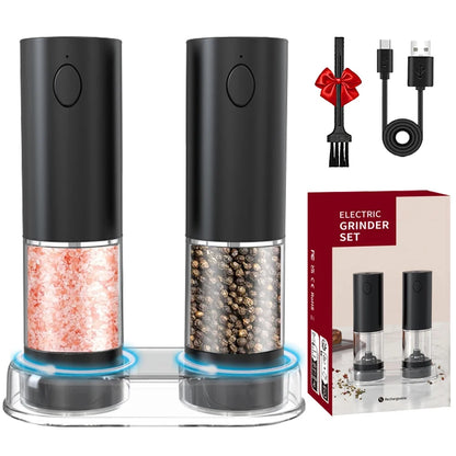 Electric pepper and salt grinder set with packaging, cable, and brush on a white background.
