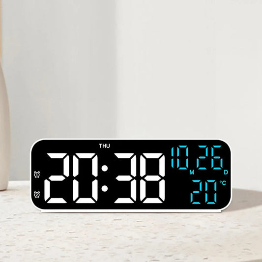 Digital clock with large display on a white surface