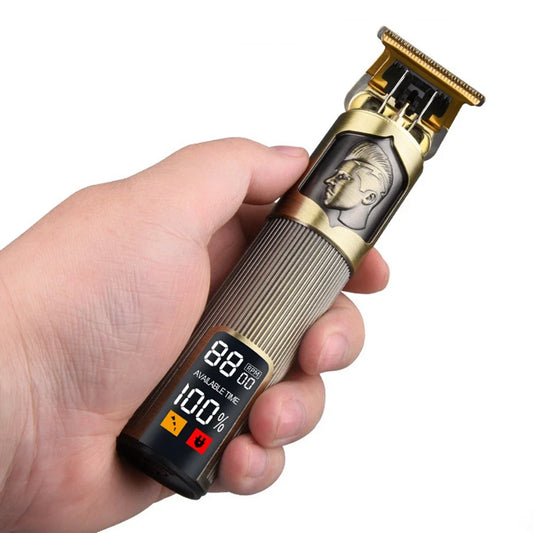 Hair trimmer held in a hand with a white background