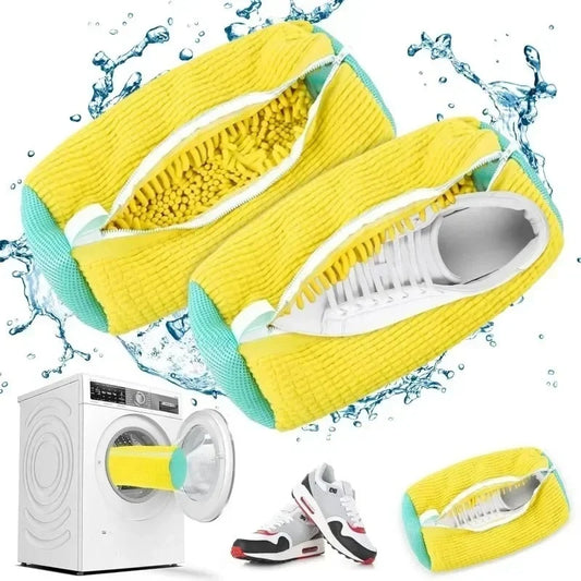 Yellow shoe cleaning brush with water droplets and a washing machine in the background